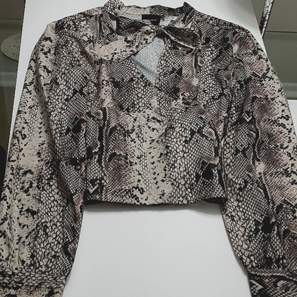 Long sleeve animal print blouse with tie neckline